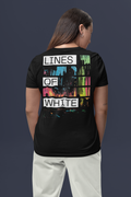 Time For The Underground back-print tee by Lines Of White — back view, worn by a woman in a studio