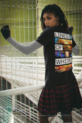Golden Hour back-print tee by Lines Of White — back view, worn by a woman in a 90s outfit