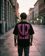Pink Smile t-shirt back print worn walking home at sunrise after a night out