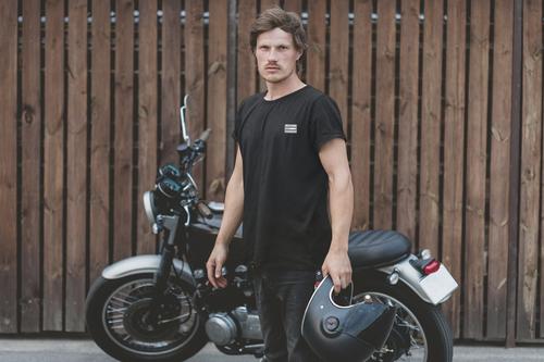 Cerebral Divide back-print tee by Lines Of White — worn by a man with a motorbike